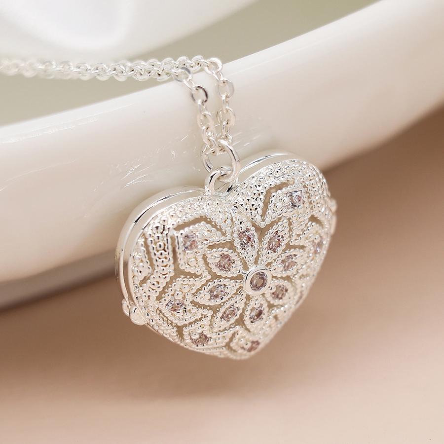 POM Silver plated heart shaped filigree and crystal locket