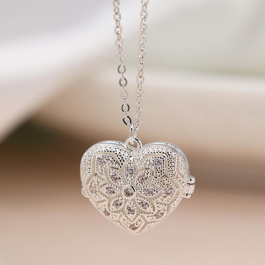 POM Silver plated heart shaped filigree and crystal locket