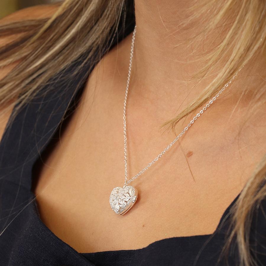 POM Silver plated heart shaped filigree and crystal locket