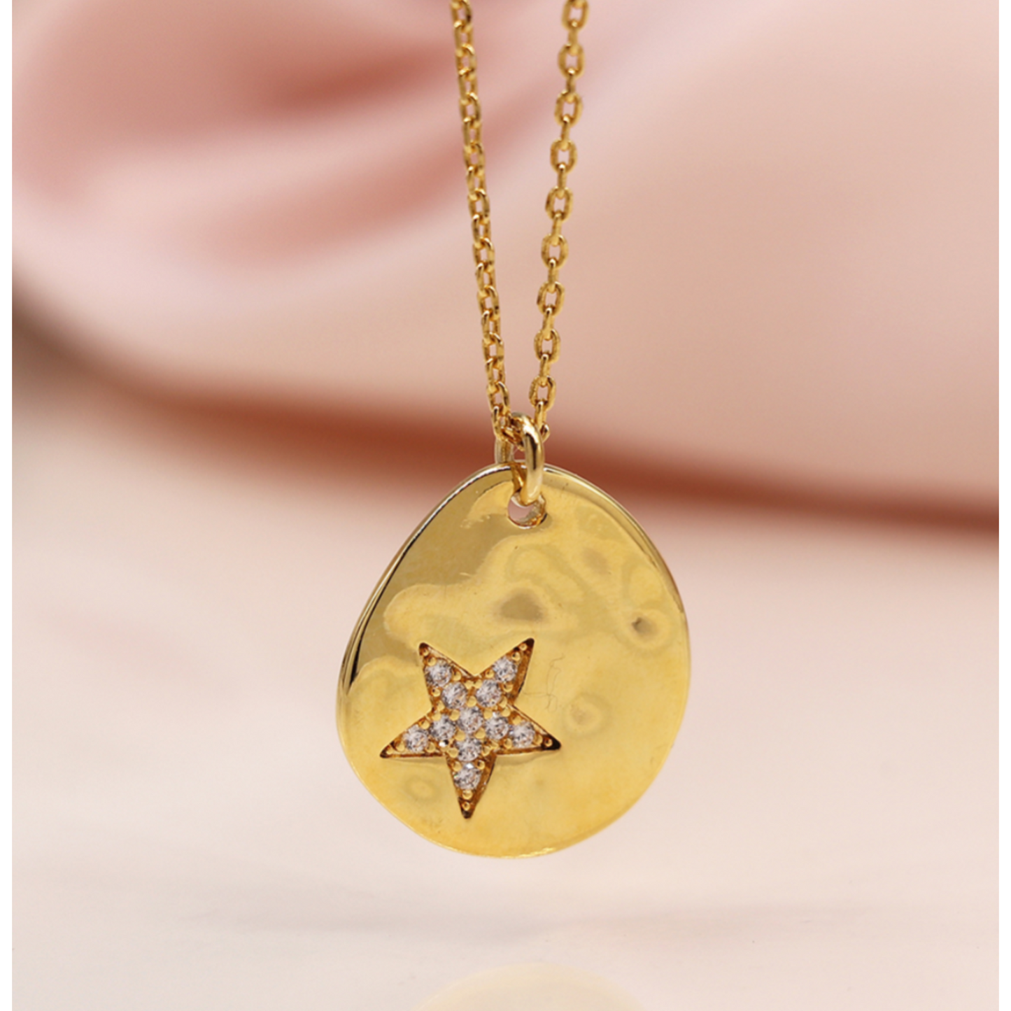 POM Faux gold organic polished teardrop necklace with crystal star imprint