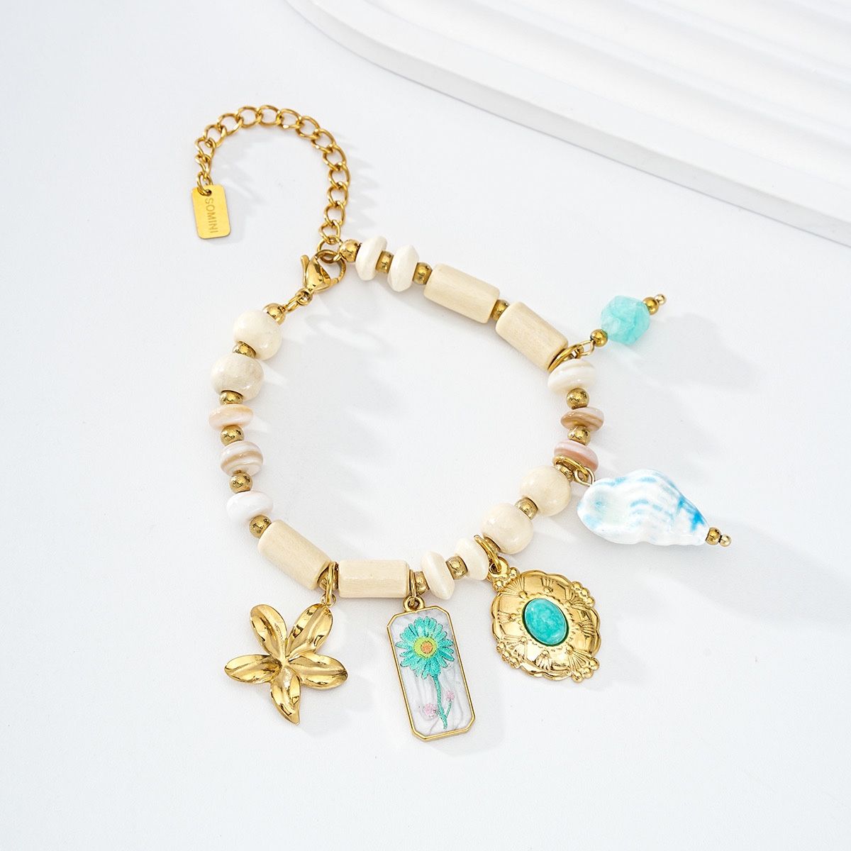Cream Gold & Turquoise Charm Bracelet