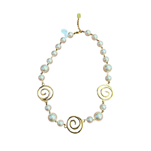 Ivory pearl and gold swirl design necklace