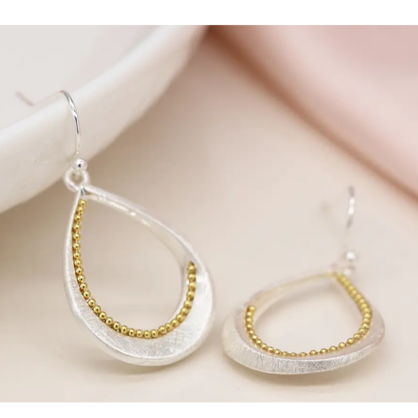 POM Silver plated brushed twist teardrop earrings with golden bead detail