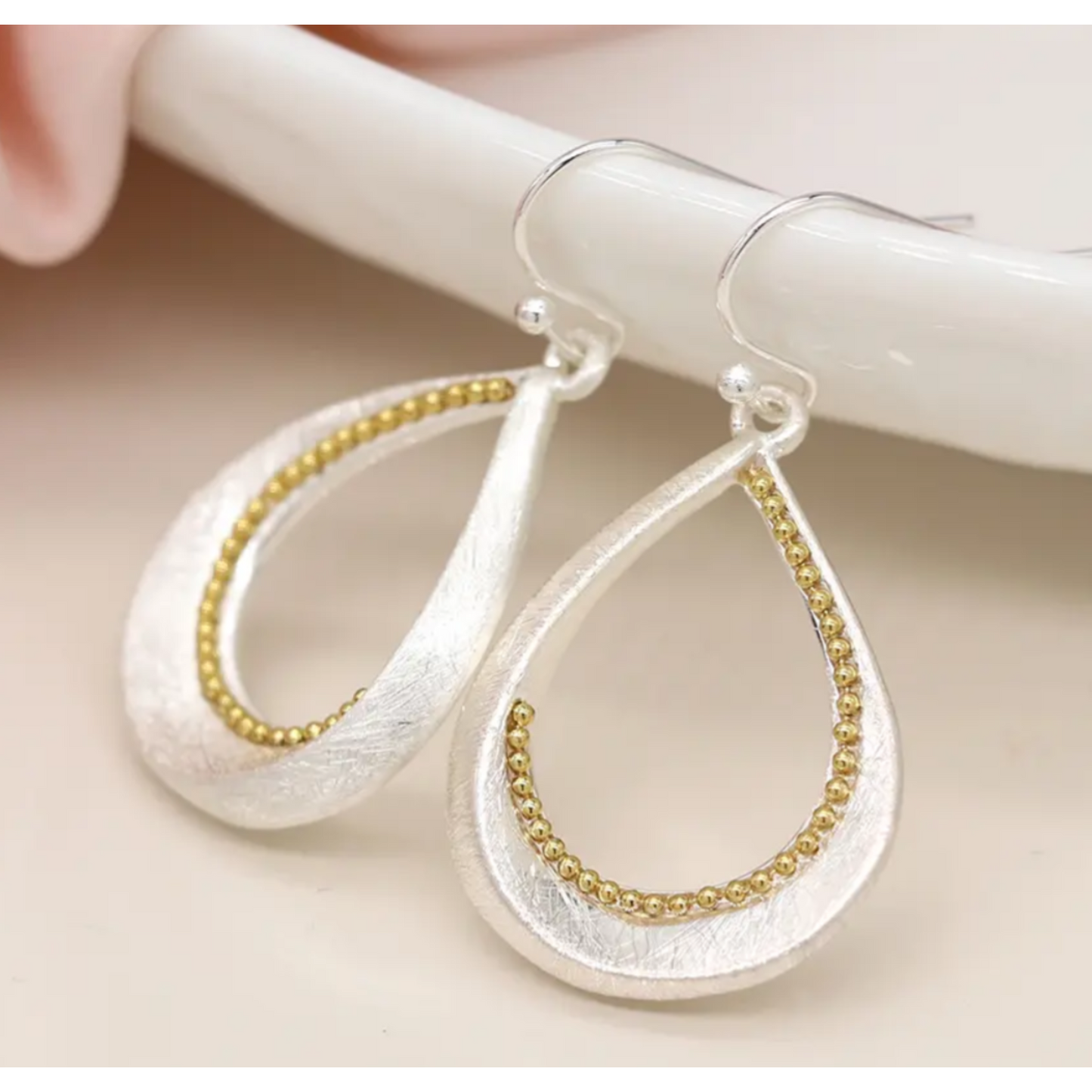 POM Silver plated brushed twist teardrop earrings with golden bead detail