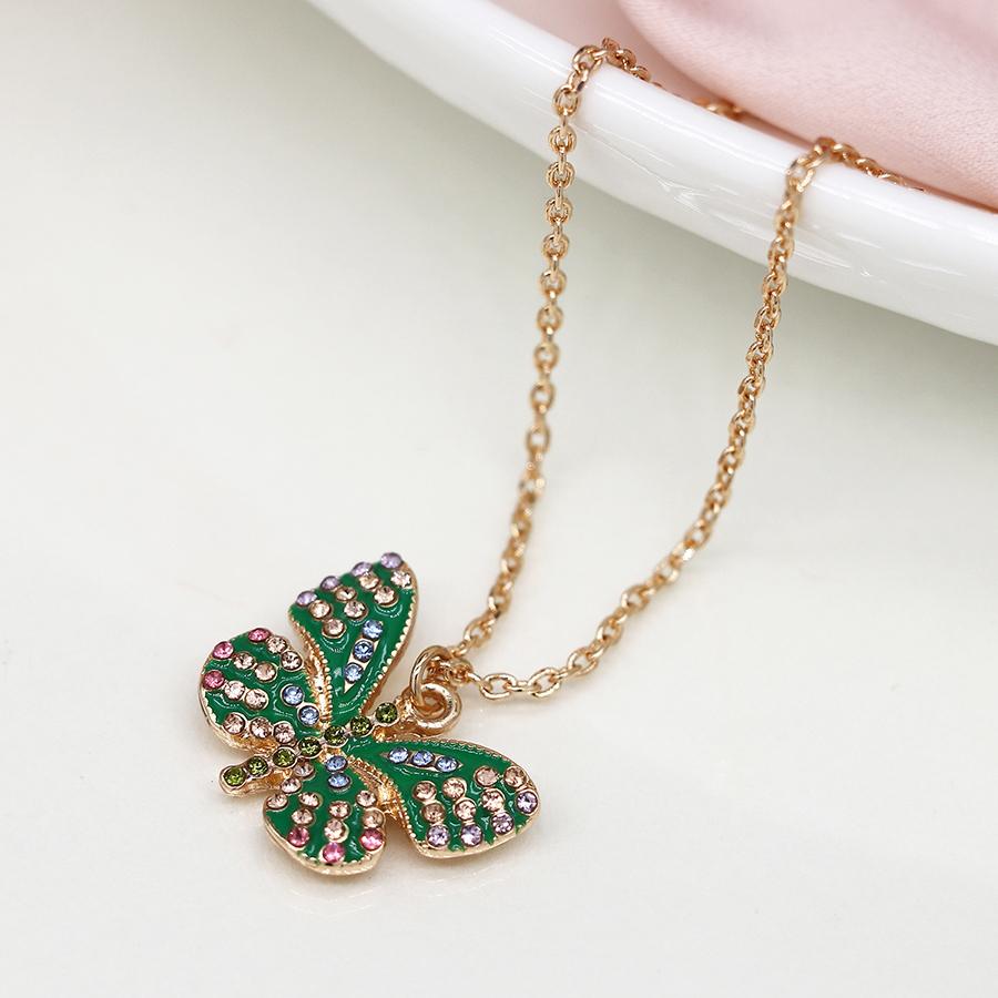 POM Faux gold plated green enamel and crystal butterfly necklace